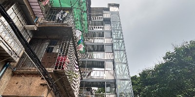 广州一业主两套房打通想少交一户电梯费，其他业主不同意，法院：补交另一户电梯加装费